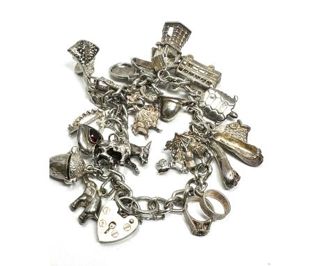 A Vintage Silver Charm Bracelet With Assorted Charms (68g) 