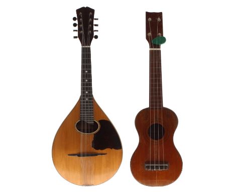 Vega flatback pear shaped mandolin with spruce table and faux tortoiseshell scratchguard; also an old ukulele stamped La Fole
