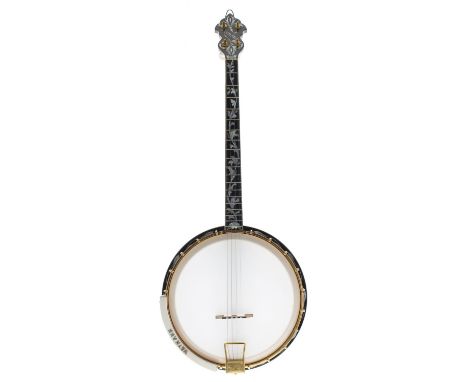 Good Weymann Deluxe tenor open back banjo, with banded resonator, foliate carved heel and profusely inlaid with mother of pea