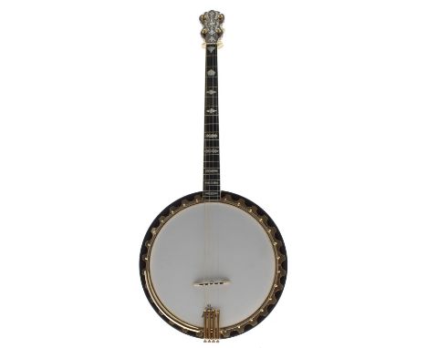 Good Vega Artist Tenor banjo, with segmented satinwood inlaid resonator, foliate carved heel and fine engraved geometric moth