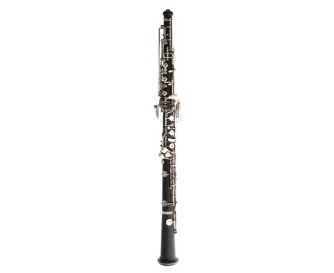 Good semi-professional German Blackwood oboe by and stamped Sonora, with semi-automatic octave keys, within original stitched