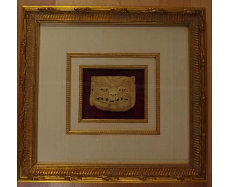 Vintage Oriental carved ivory mask circa 1920s, in gilt frame, ex Edith Elizabeth Antiques, 6cm high approx. NB. This item ca
