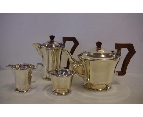 Sterling silver tea & coffee service comprising of teapot (25cm wide 15cm high) & coffee pot both hallmarked Birmingham 1946,