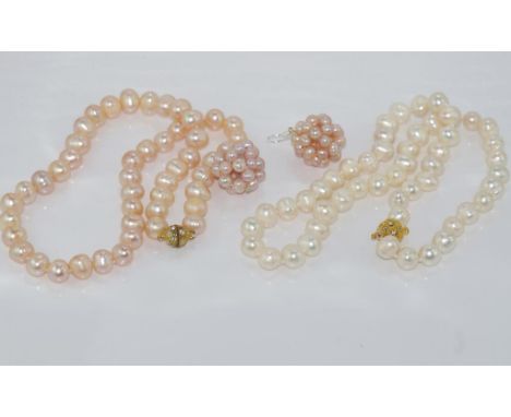 Two sets of pearl necklaces (cream and pink) with a similar set of pink pearl earrings
