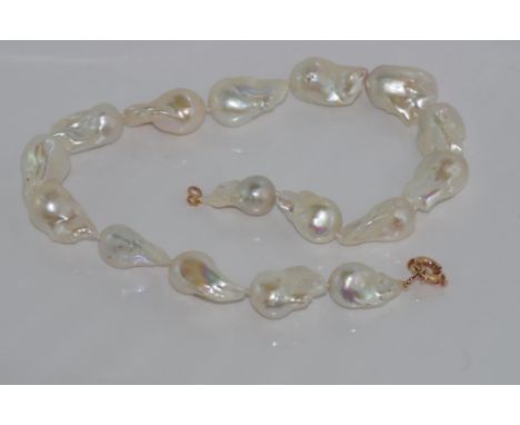 Well matched baroque pearl necklace with 9ct rose gold bolt ring clasp, 46cm long approx