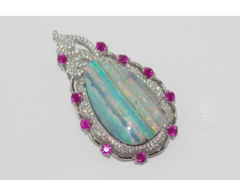 Silver and boulder opal pendant enhanced with synthetic rubies and diamonds, size: approx 4.8cm including bale