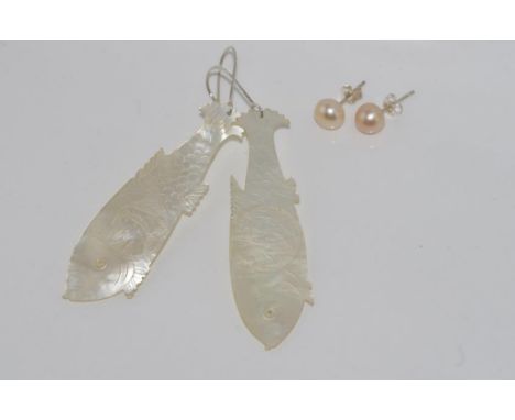 Pair long drop mother of pearl fish earrings with a pair of silver pearl earrings