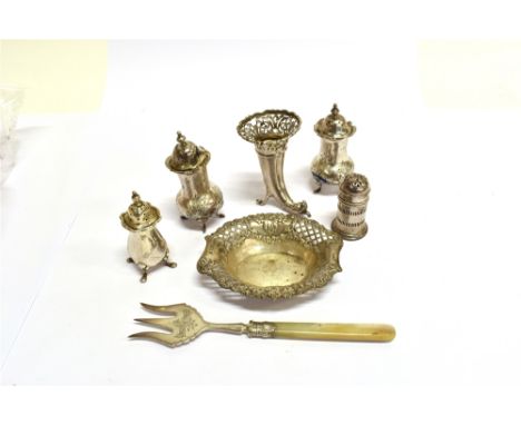 A COLLECTION OF SMALL SILVER INCLUDING A HORN-SHAPED SPECIMEN VASE with a stylised dolphin terminal, a floral pierced band an