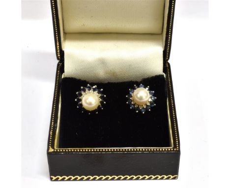 TWO PAIRS OF MODERN GEM SET EARRINGS comprising; a pair of cultured-pearl, sapphire and diamond cluster stud earrings, each c