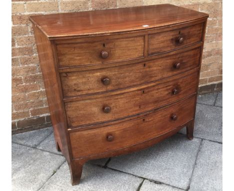 A MAHOGANY BOW FRONT CHEST OF TWO SHORT AND THREE LONG DRAWERS on splayed bracket feet, 106cm wide 52cm deep 102cm high