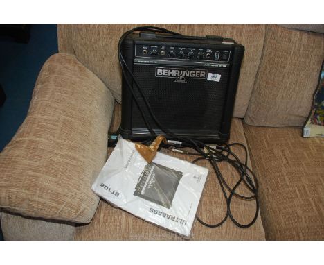 A Behringer 15 watt Ultra Bass amplifier.
