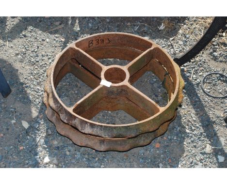 Two 19" cast iron roller rings.
