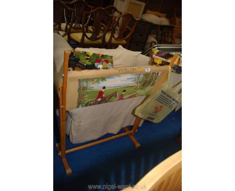 A large tapestry stand and part made tapestry plus a box of wools.
