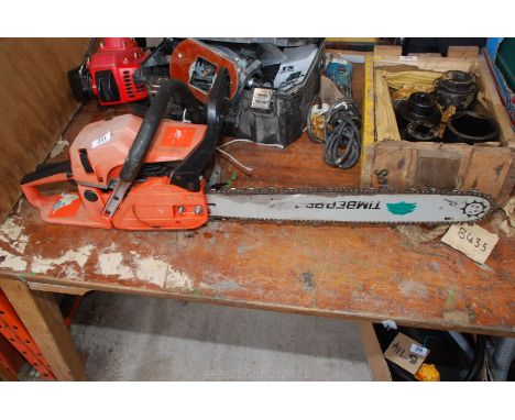 A timber Wolfe chainsaw having good compression, (chain brake casing worn.)  