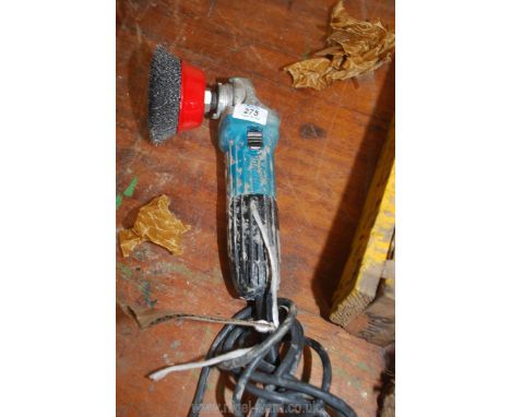 A Makita angle grinder with wire brush attachment. (needs guard prior to use.) 