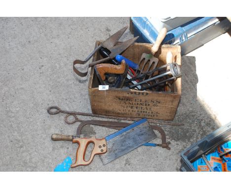 A wooden cartridge box containing hand tools, saws, plane, etc. 