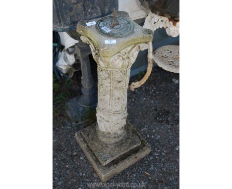 A concrete garden pillar with sundial top in brass, 34" tall. 