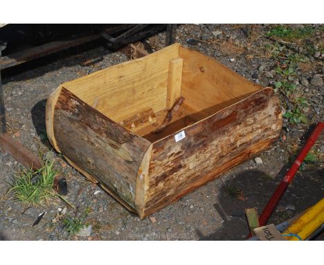 A large rustic wooden planter 24" x 13" x 17".