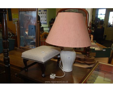 A china lamp and shade plus a small foot stool.