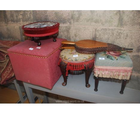 A pair of bellows, tapestry top stools and a small Ottoman.