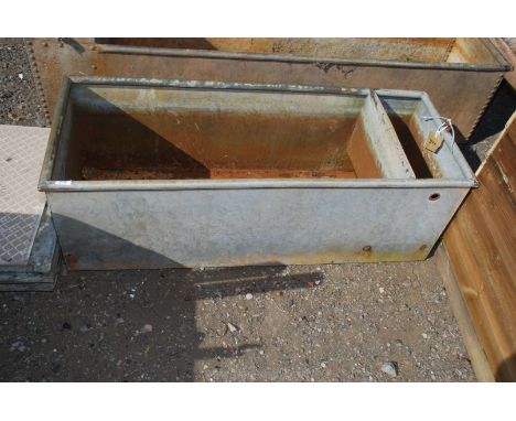 A water trough a/f, 19" x 17" x 4' long.