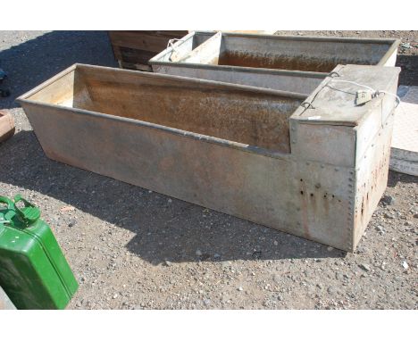 A water trough, 18" x 16" x 6' long.