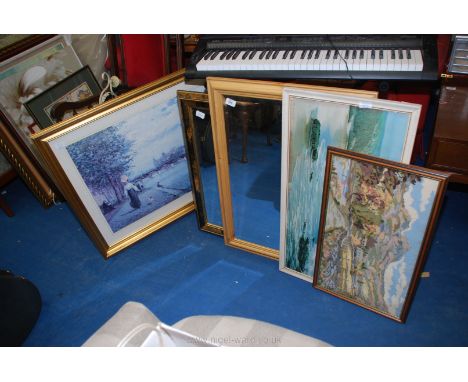 Two large mirrors, a tapestry and two prints.