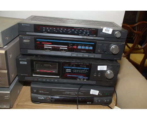 A Hitachi radio tuner and tape player, with a Goodmans VHS player a/f. Sold As Seen.