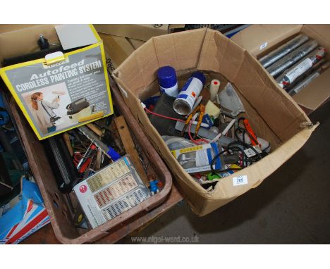 A box of decorating equipment and tools. 