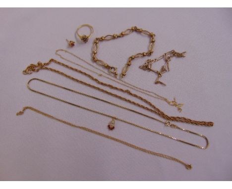 A quantity of 9ct gold jewellery to include bracelets, chains, a ring and an earring