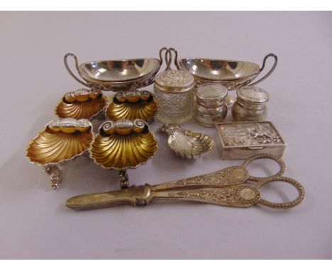A quantity of silver to include four silver gilt Victorian shell salts, a silver snuff box, a pair of grape scissors, a pair 