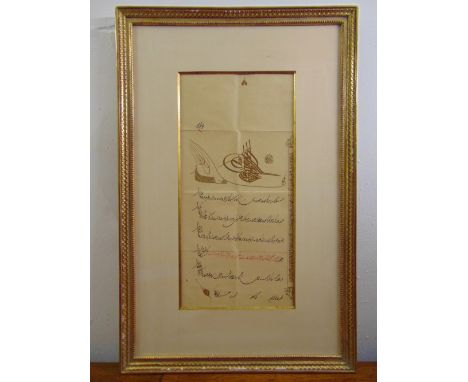 A framed and glazed Farsi calligraphic manuscript, 54 x 26cm
