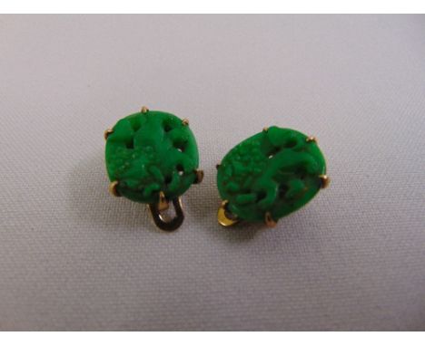 A pair of Chinese 14ct gold and jade earrings