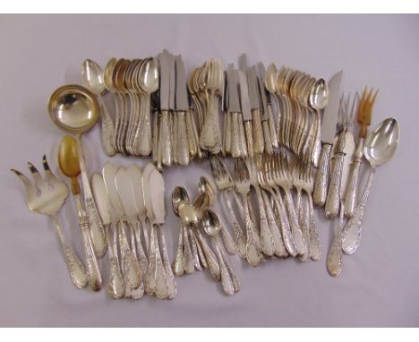A quantity of continental silver plated flatware to include a soup ladle, salad servers and fish eaters