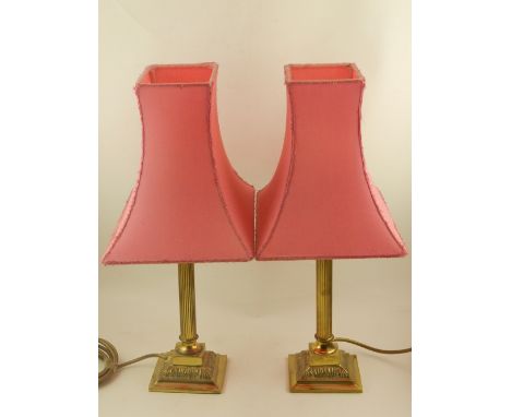 A pair of brass lamp bases of Corinthian columns, H.27cm