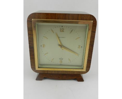 An early 20th century burr walnut cased alarm clock, by Prestons Ltd.