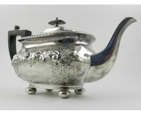 William Hutton & Son, an early 20th century silver plated teapot, repousse embossed with flowers, foliage and scrolls, raised
