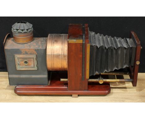 A substantial Victorian brass-bound mahogany and japanned tin table-top magic lantern, 23.5cm magnifying lens within an integ