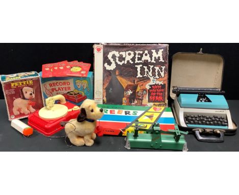 Toys - assorted 1960s, a Louis Marx record player, boxed; Pettie the Frisky Pup, boxed; a Lilliput typewriter; other games an