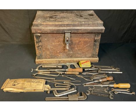 A stained pine tool chest, fitted with drawers, assorted metal and engineering tools, wrenches, etc 