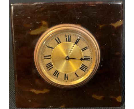 A early 20th century tortoiseshell easel strut dressing table clock, eight-day movement, c.1930 