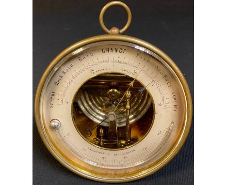 A 19th century lacquered brass aneroid barometer, 13cm diameter 