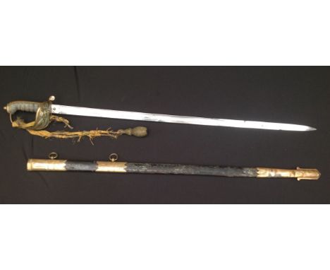 A Victorian Royal Navy officers sword, the 80cm single edged fullered blade proof marked along with etched decoration of Quee