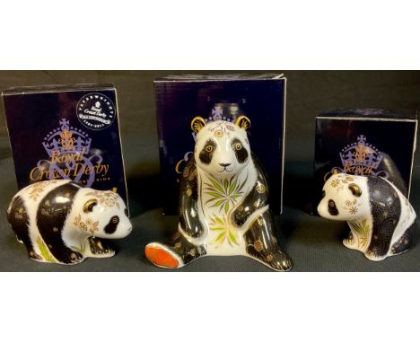 A set of three Royal Crown Derby paperweights, Giant Panda, Baby Panda Walking and Baby Panda, gold stoppers, printed marks, 