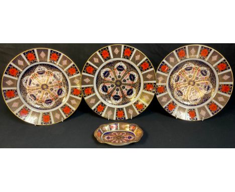 A pair of Royal Crown derby Imari 1128 pattern dinner plates, 27cm; another; an 1128 pattern shaped rectangular trinket dish,