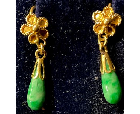 A pair of gold and polished jade droplet earrings, rope twist flower head terminals, unmarked, probably 18ct, early 20th cent