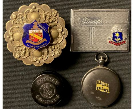 An armorial box, Barrow in Furness; a stamp case, Southsea; an RNLI compass; a bakelite pocket compass 