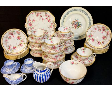 A Spode part tea service, decorated with pink roses, comprising cake plates, side plates, cups and saucers, etc; another part