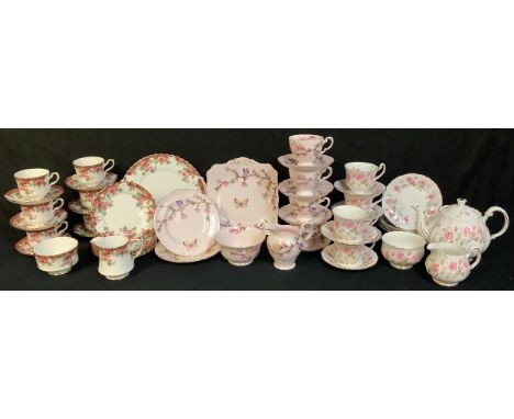 A Tuscan tea service, decorated with butterflies on a light pink ground, printed marks;  a Royal Stafford Olde English Garden