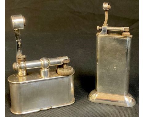 A Dunhill table lighter, Patent No. 390107, Reg'd Design no. 737418; another, Dunhill Standard table lighter (2) 